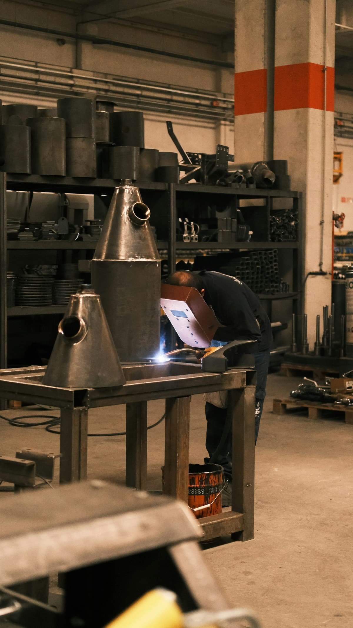Structural welder at a fabrication facility
